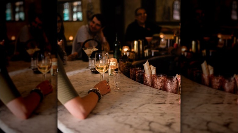 People chatting at the Ciao Roma bar