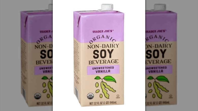 Carton of Trader Joe's Organic Non-Dairy Unsweetened Vanilla Soy Beverage against white background.