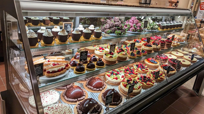 Pastries and cakes in a glass case at Wegmans