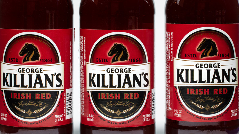 Three Killian's Irish Red bottles