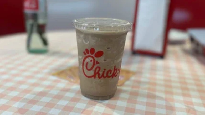 S'mores Frosted Coffee in takeout cup on chick-fil-a table