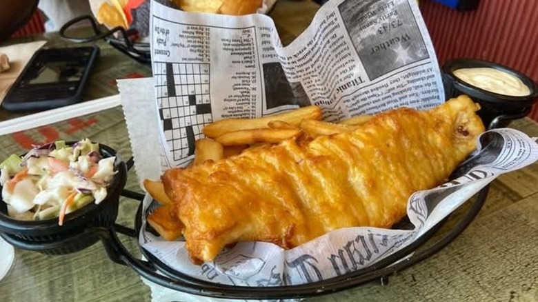 Archie's British Restaurant fish and chips with coleslaw and tartar sauce on the side