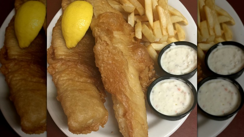 Fish and chips with a lemon wedge