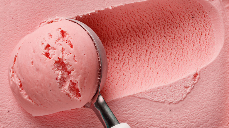 scooping pink ice cream