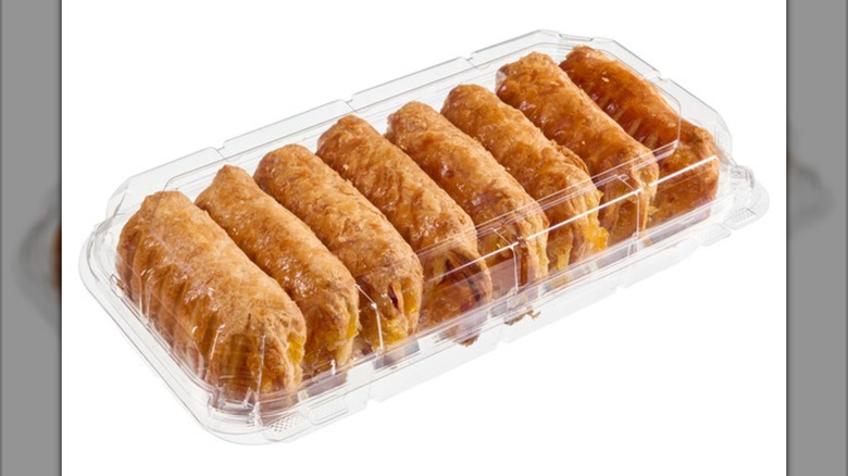 Plastic package with eight flaky peaches and cream filled pastries.
