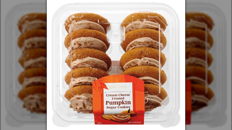 Package of pumpkin sugar cookies with cream cheese frosting.