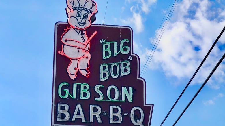 The Big Bob Gibson Bar-B-Q sign with a pig dressed as a chef