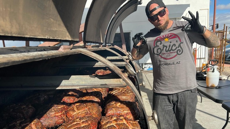 Pit master Luke Unrein cooking meats for Eric's Family Barbecue