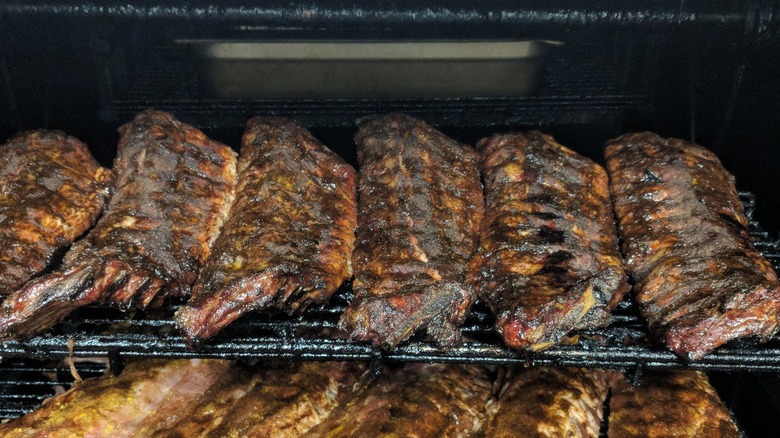 Racks of ribs on a grill