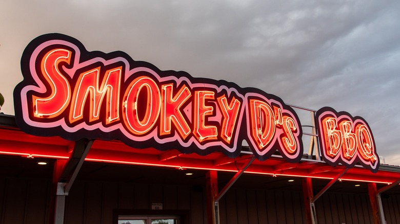 The Smokey D's BBQ neon sign at the entrance