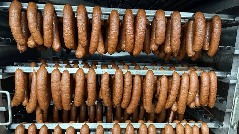 Sausages hanging on a rack