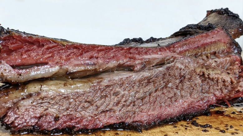 Barbecue meat cut in half