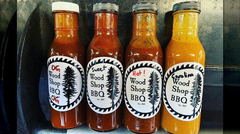 Four bottles of Wood Shop BBQ sauces
