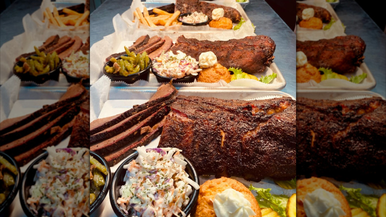 platters with meat, coleslaw, and cornbread