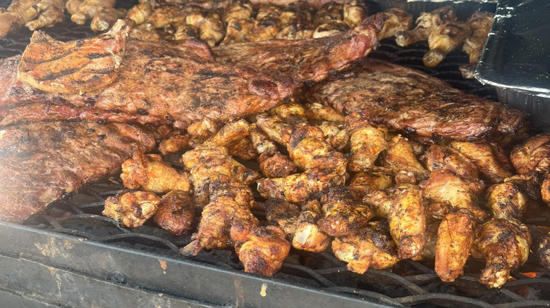 A pile of meat on a grill