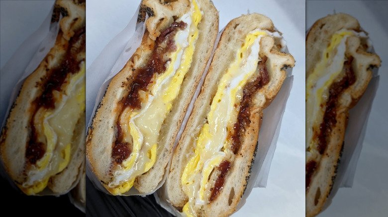 BEC breakfast sandwich split in half