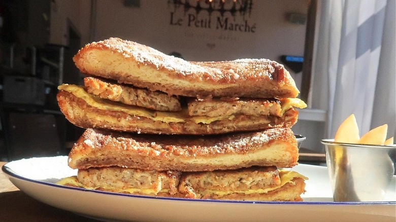 Vanilla-Rum French Toast Sandwich on a table at Le Petit mARCHE