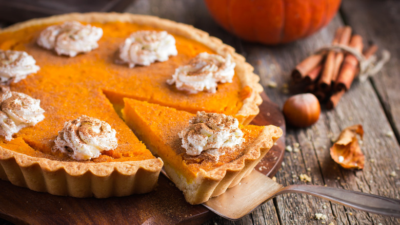 Pumpkin pie on serving utensil