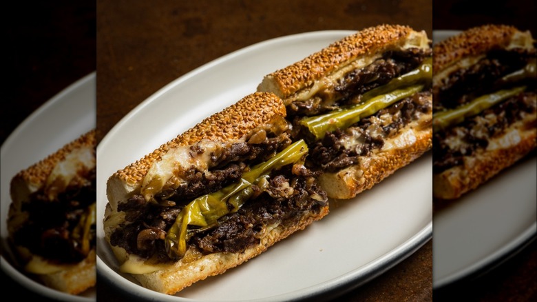 Matu cheesesteak sandwich on a white plate