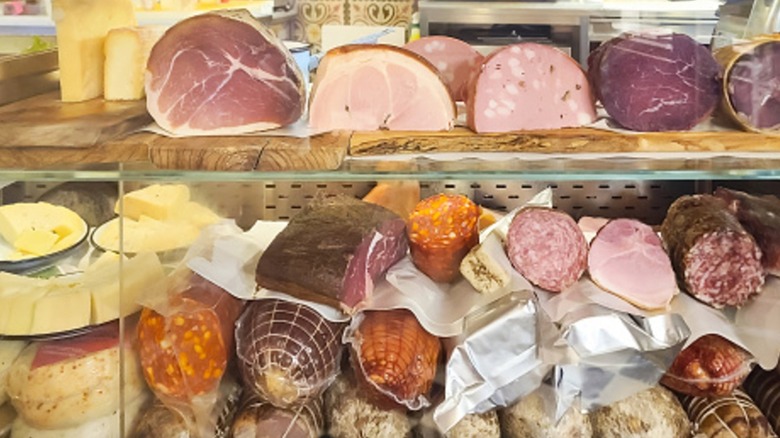 deli case with meats and cheeses