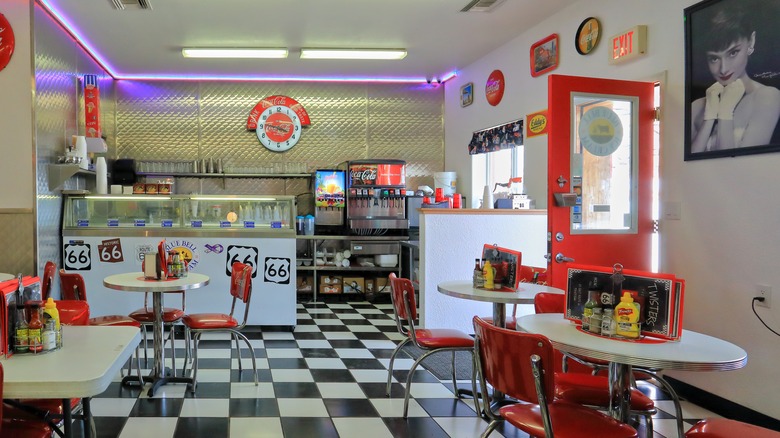 Interior of '50s-style diner with Route 66 signs