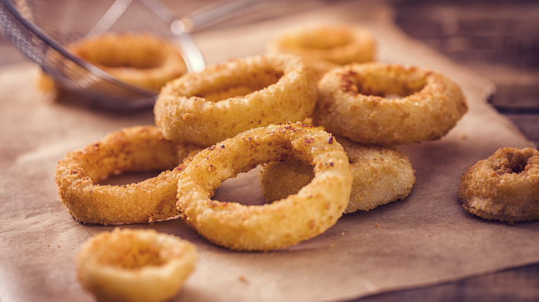 Onion rings on paper