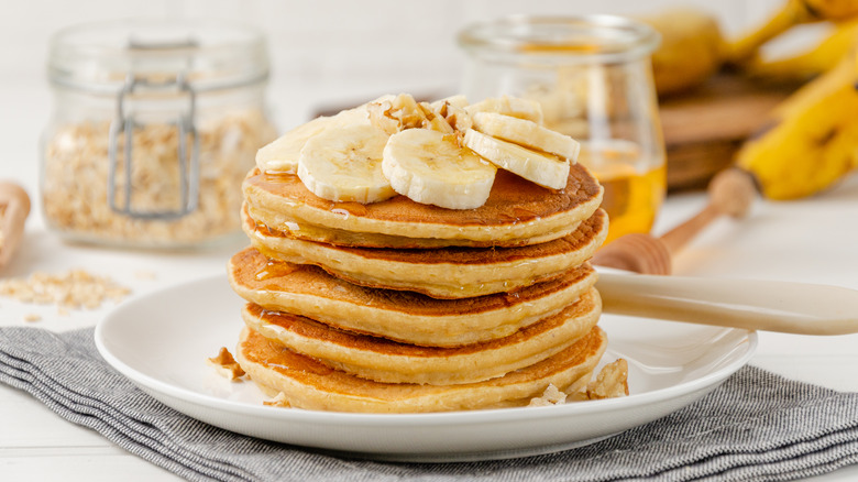 Stack of pancakes with banana
