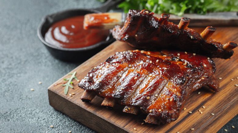 Pork ribs on chopping board