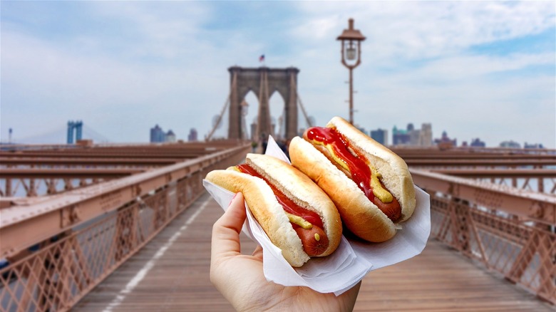 Two hot dogs on bridge