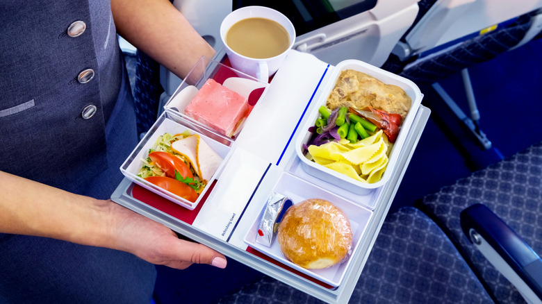 Food on a tray in an airplane