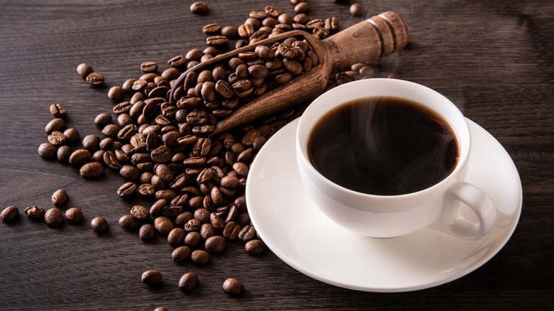 Brown coffee beans on wood