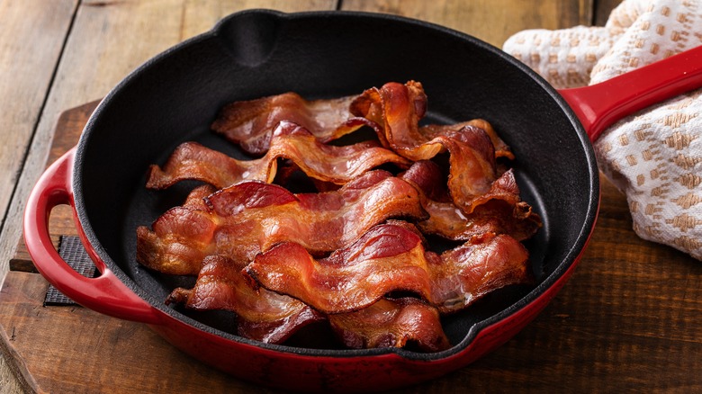 Bacon strips in skillet