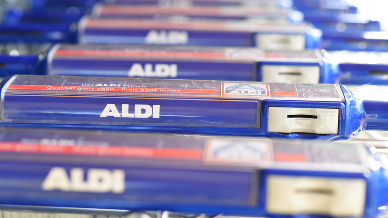 Aldi shopping carts in row