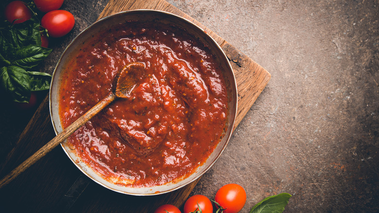 pan with red pasta sauce