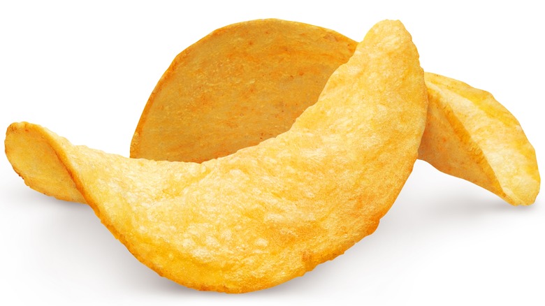 Pringles-type chips on white background