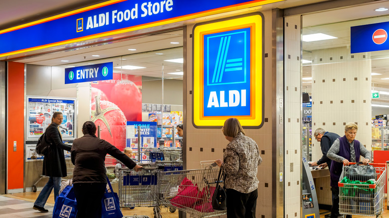 Shoppers outside Aldi store