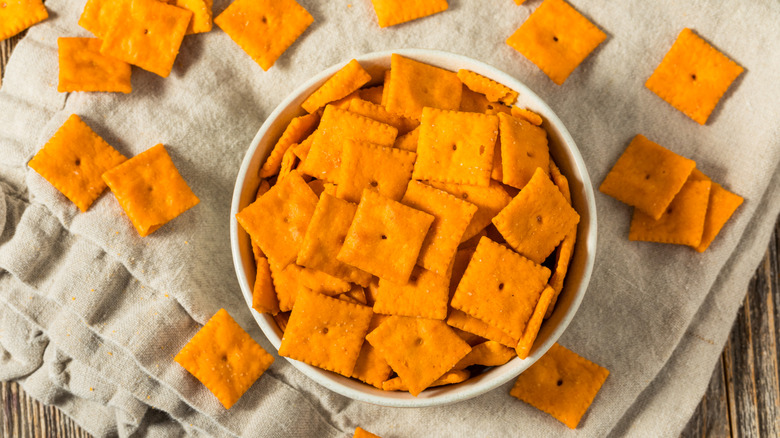 Bowl of cheese-flavored orange snack crackers