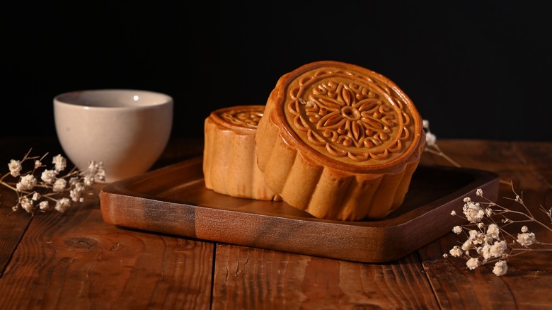 mooncakes with teacup and flowers