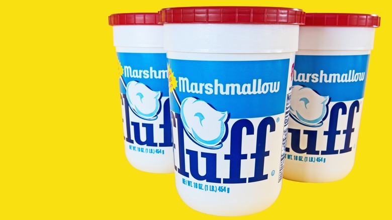 marshmallow fluff jars on yellow background