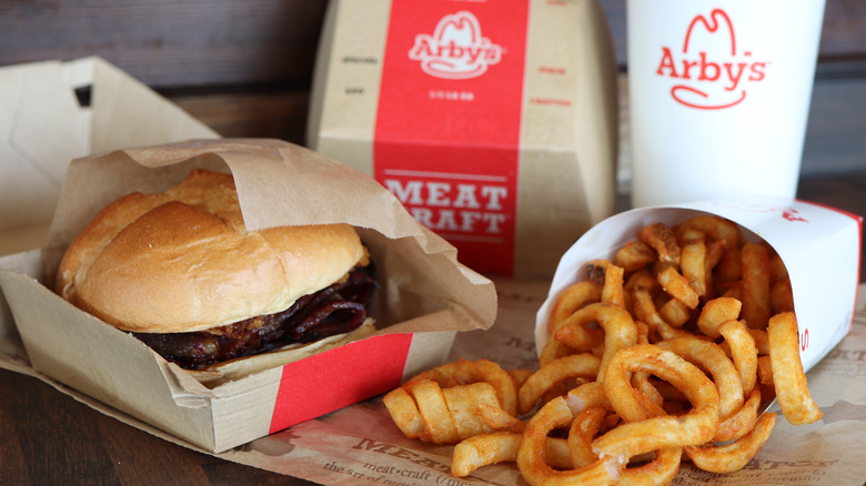 Arby's cup, sandwich, and fries
