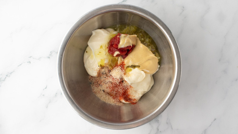 Various sauce ingredients unmixed in bowl