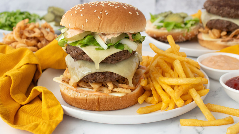 McDonald's Big Arch burger on plate with fries