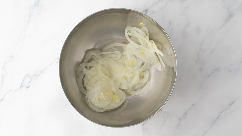 Sliced onion in bowl