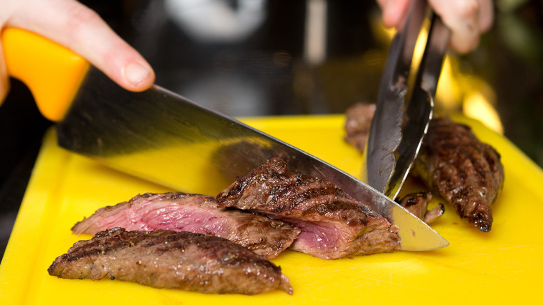Cutting kangaroo meat 
