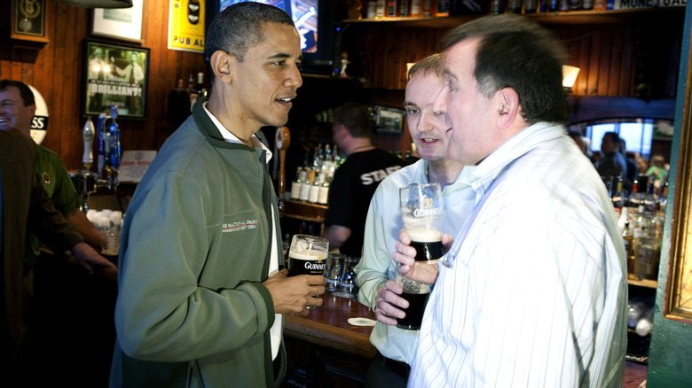 Barack Obama holding a pint of Guinness at The Dubliner