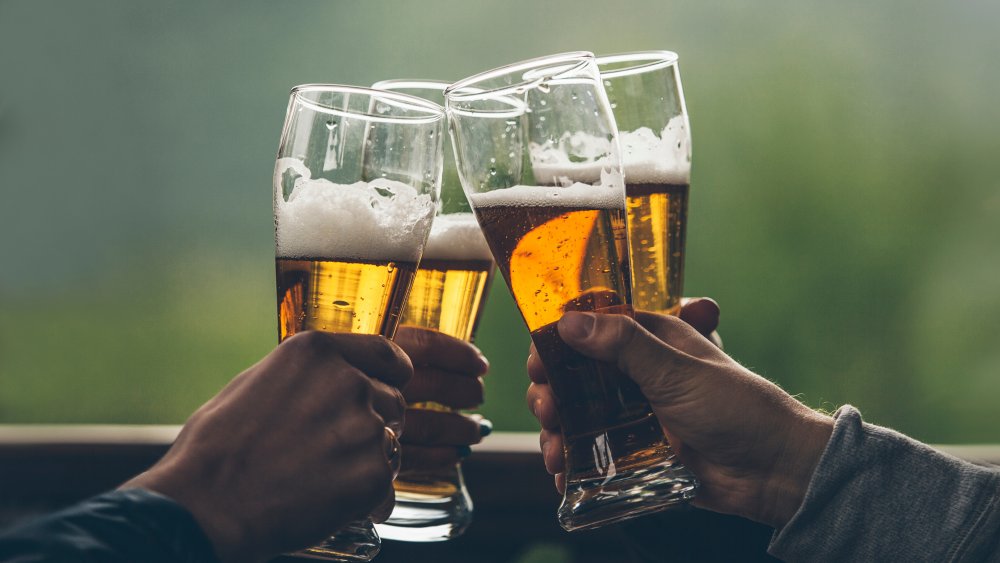 Beer glasses in a toast