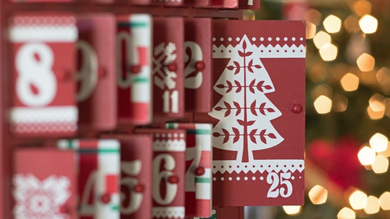 An advent calendar with doors opened