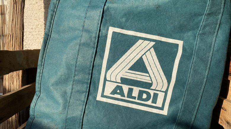blue and white Aldi shopping bag