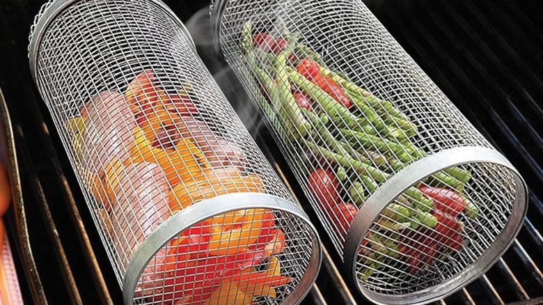 Two Charbroil rolling baskets on grill