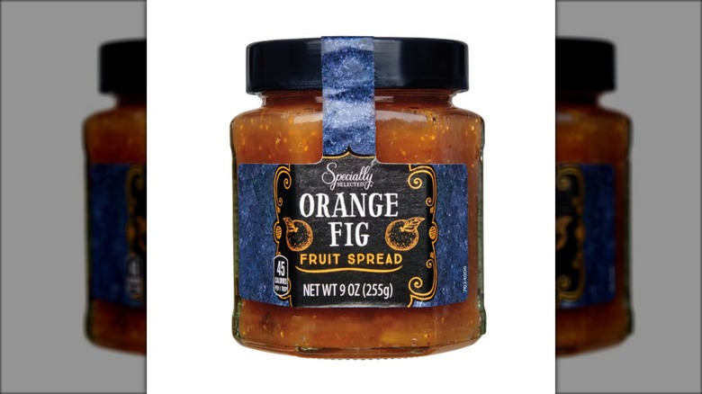 jar of orange fig flavored fruit spread